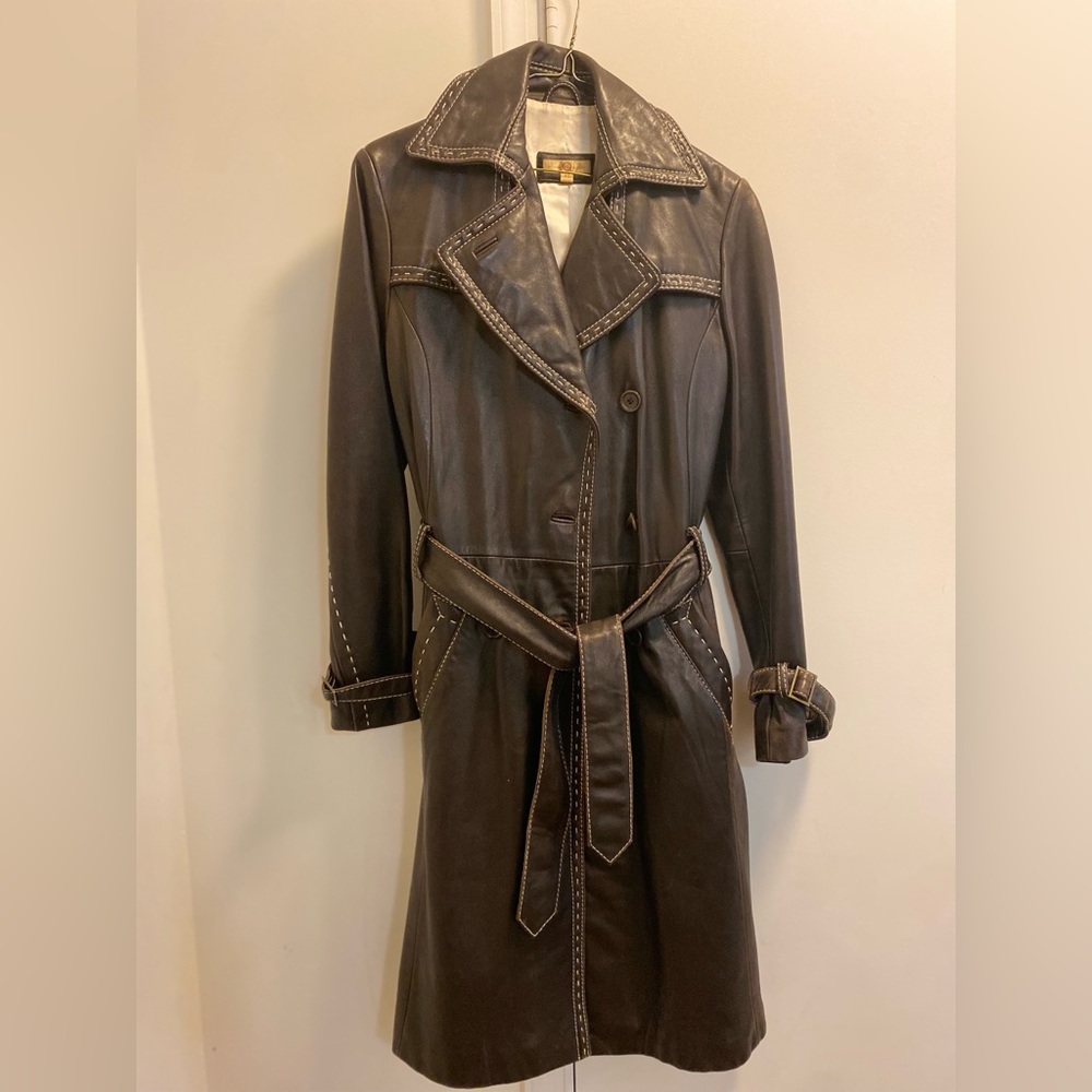 Wilson’s Leather brown trench coat with cream stitching.